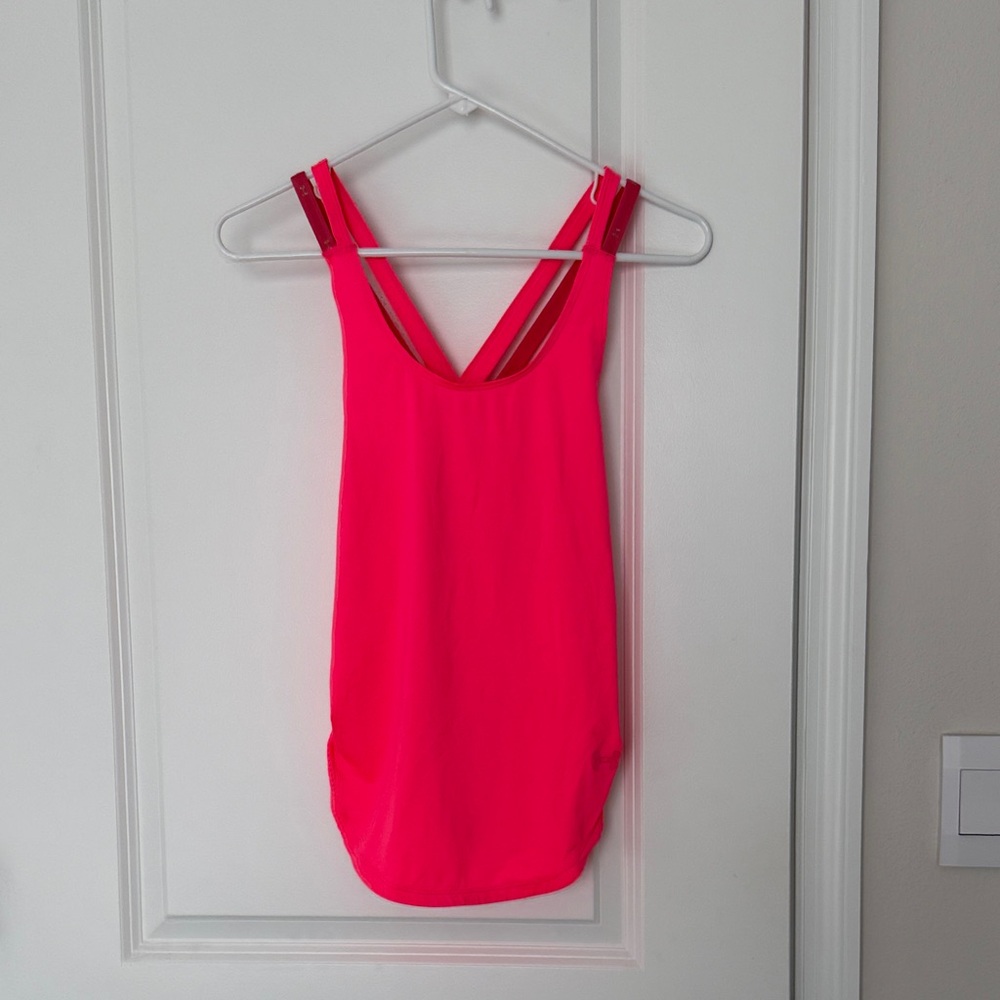 Women’s under Armour XS pink flowy tank top. Like new
